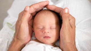 holding baby